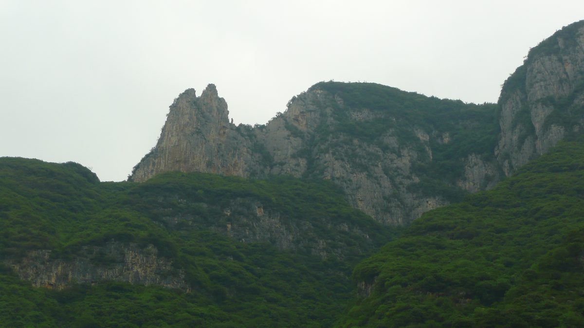The Goddess Peak rising above the forested cliffs of Wu Gorge